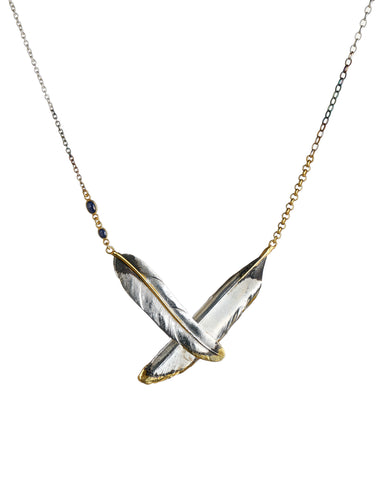 The feathered embrace necklace